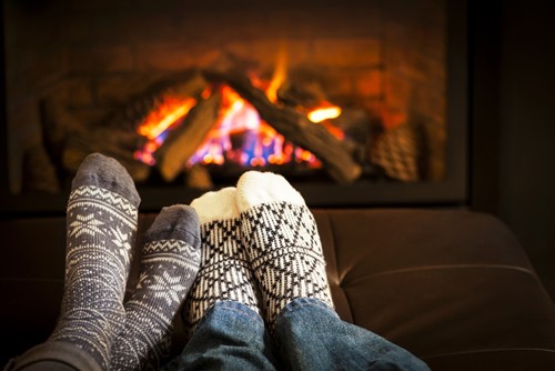 A gas fireplace can make your home cozier without the mess associated with wood-burning models.